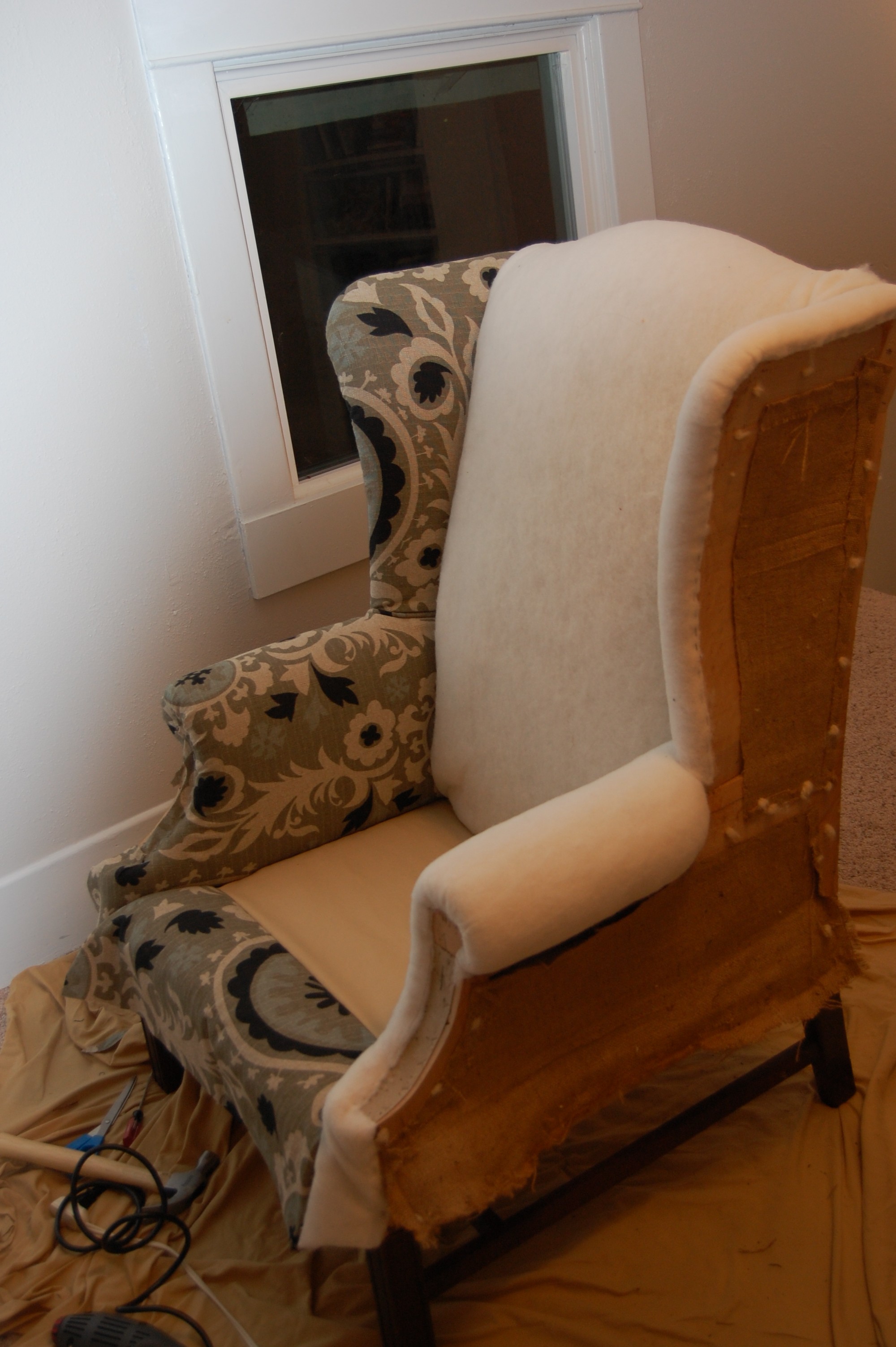 What instructional videos offer a step-by-step guide to reupholster a sofa?